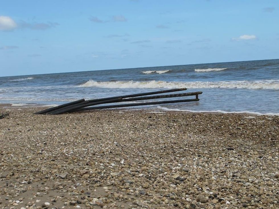 Pipes leading to Gulf at Bolivar Peninsula