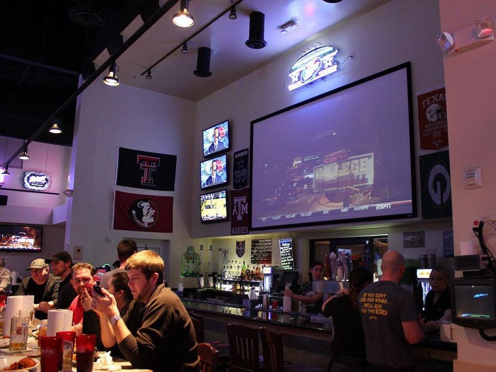 Pluckers Wing Bar in Grapevine with big screen TV