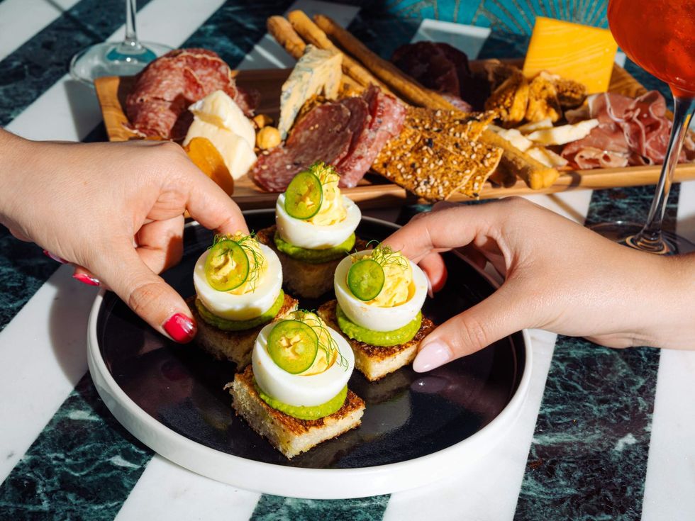 Plume bar deviled eggs on avocado toast