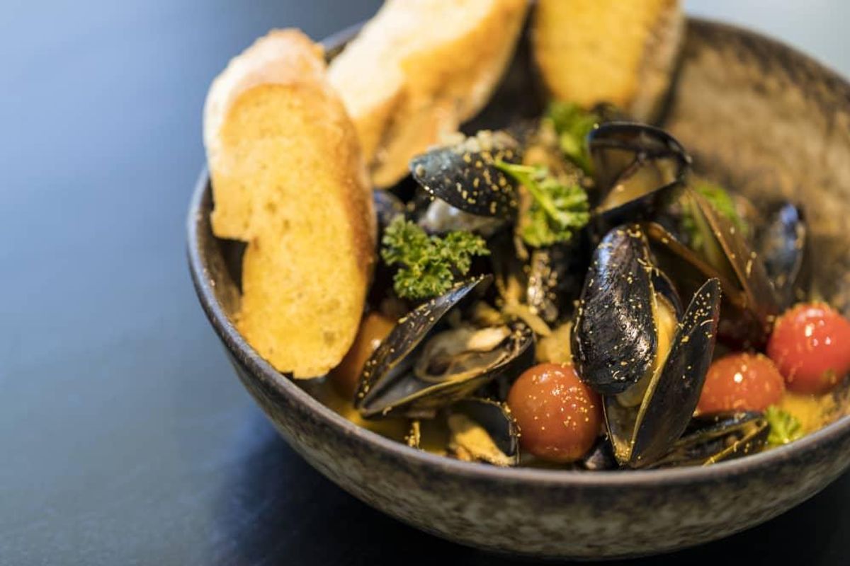 Mussels a la plancha. CultureMap Houston