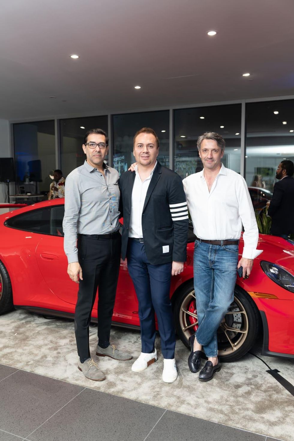 Porsche River Oaks grand opening Marcelo Saenz Adrian Due\u00f1as Andrea Perroni