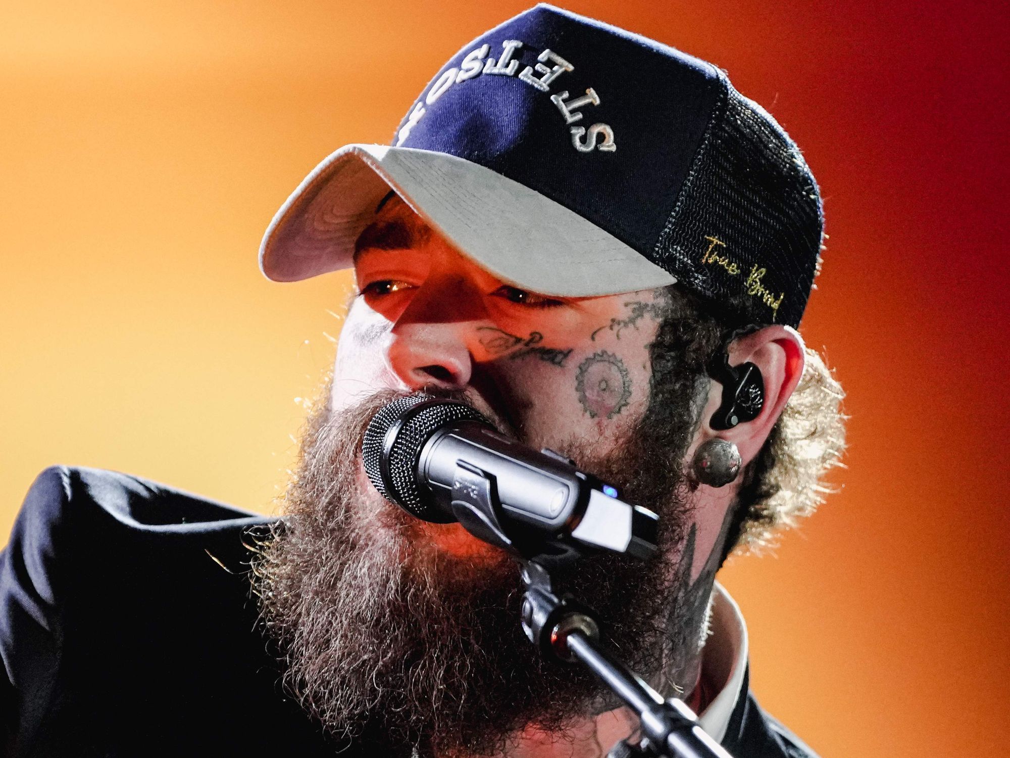 Post Malone in trucker hat