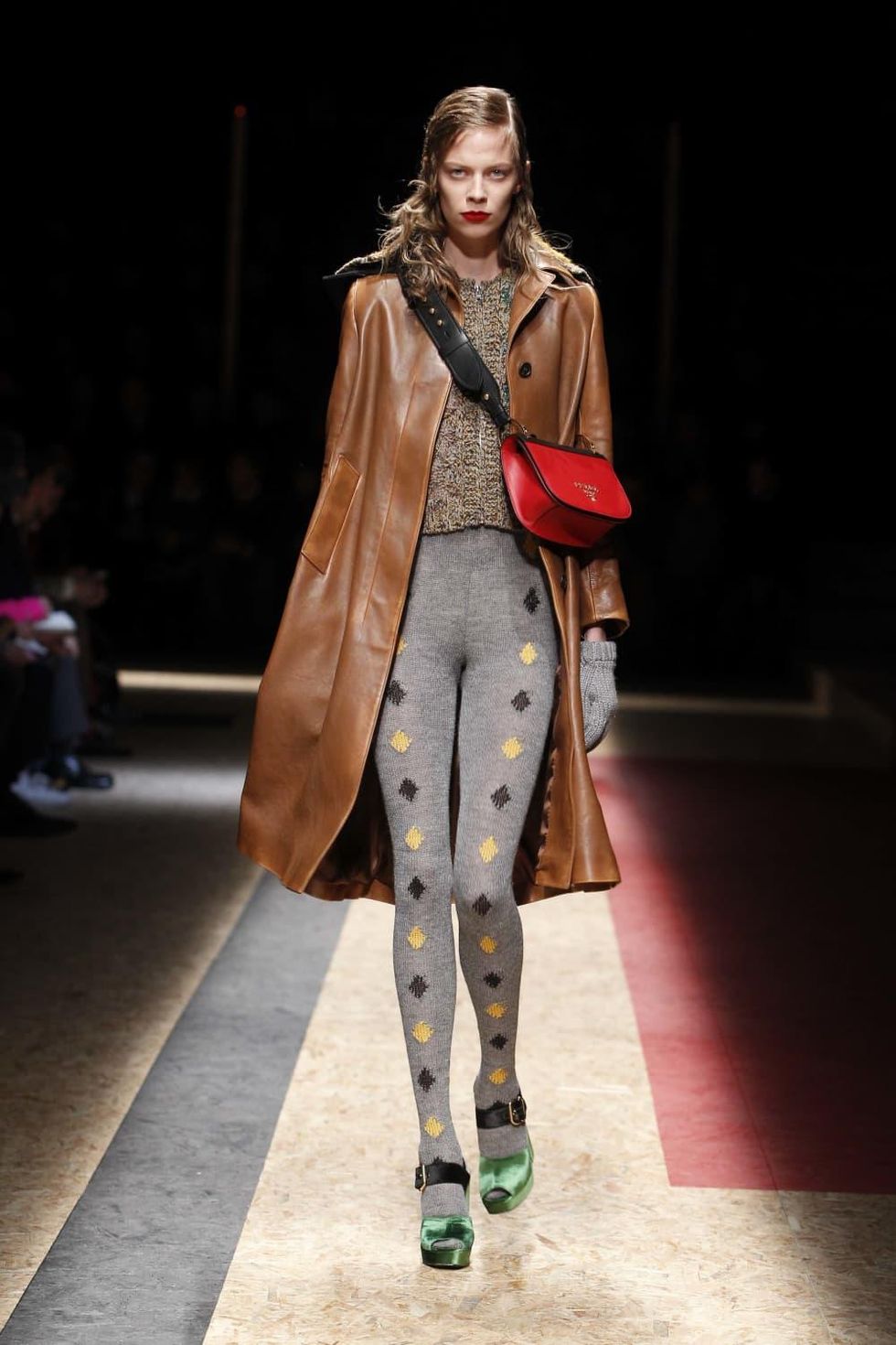 Cape coats and sailor hats were part of the Prada fall menswear collection.  - CultureMap Houston