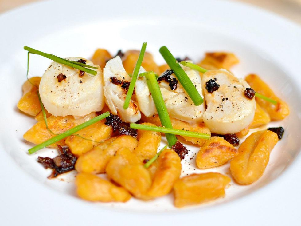 Preview Modern Seafood Cuisine scallops with sweet potato gnocchi, candied bacon and white truffle oil