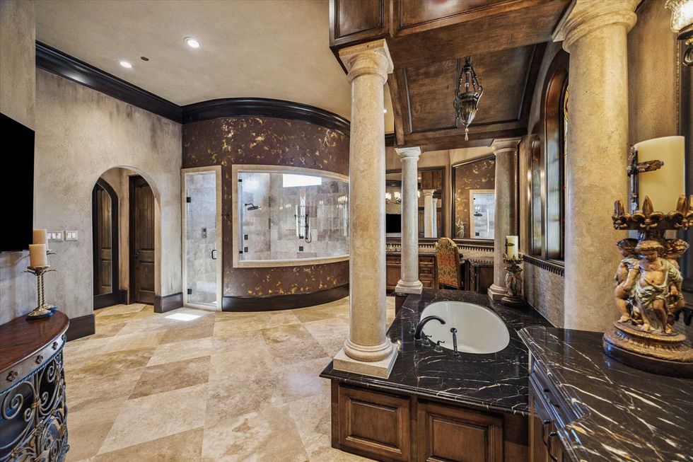 Primary suite bathroom of 11095 Memorial Drive