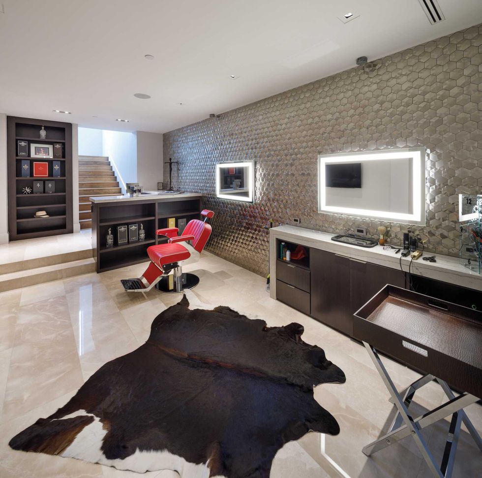 Private salon space with red barber chair of 3201 Noble Lakes Lane
