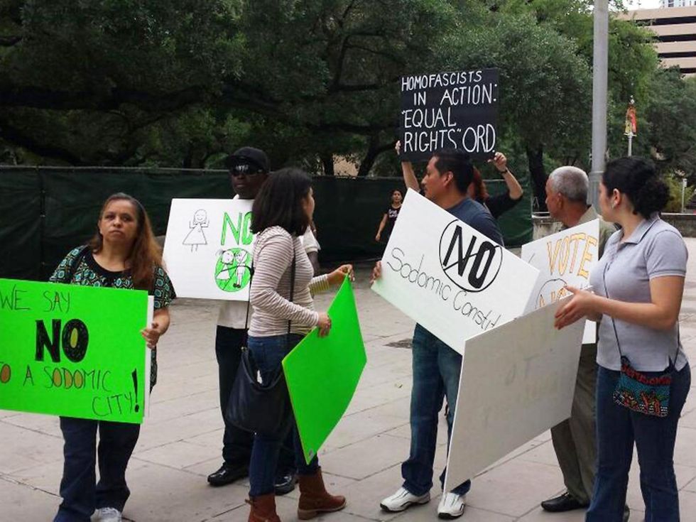 protestors of Equal Rights Ordinance with signs outside City Hall May 13, 2014