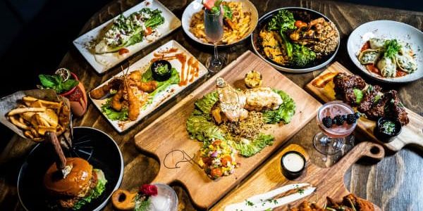 Houston-born NFL veteran fires up Southern-inspired restaurant and cigar lounge in Third Ward - Vimarsana News
