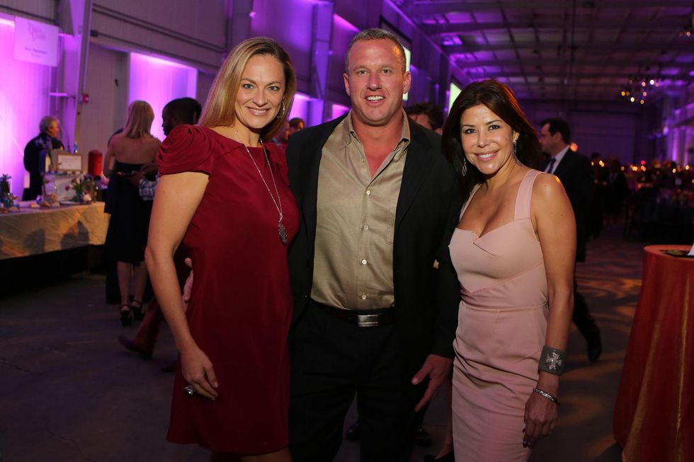 Rachel and Tom Regan, from left, with Ericka Bagwell at the March of Dimes Signature Chefs event October 2014