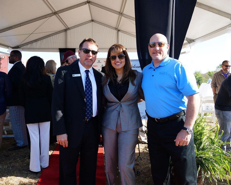 Randy Baxter, from left, Maria Moncada-Alaoui and Steve McNamara at the BMW West groundbreaking party April 2014