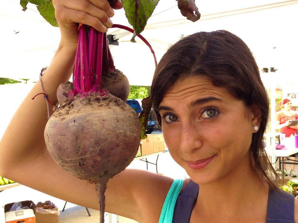 Rawfully Organic Co-op Kristina Carrillo-Bucaram with giant turnip
