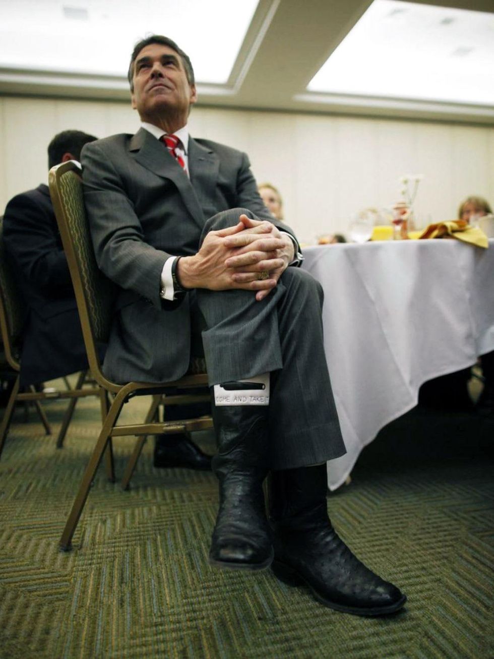 Rick Perry wearing come and take it cowboy boots