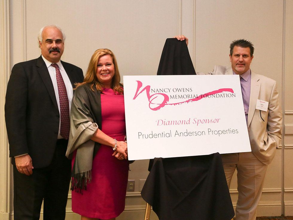 Rick Young, from left, Terri Guerra and Mike Huff at the Nancy Owens luncheon October 2013