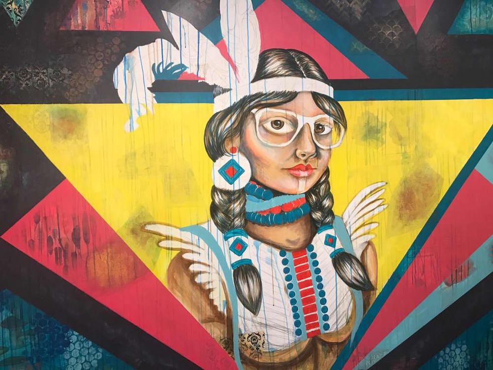 Riel restaurant women's bathroom mural