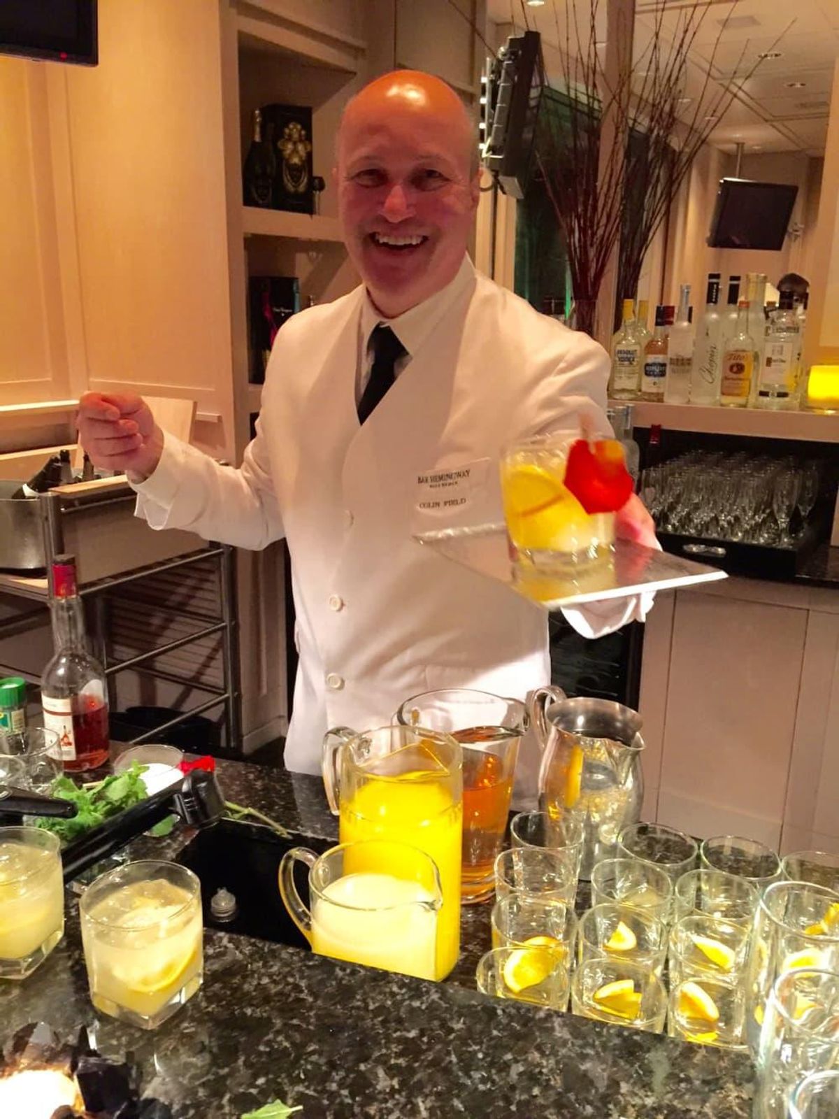 Bar Hemingway bartender Colin Field, picture here at a Houston party