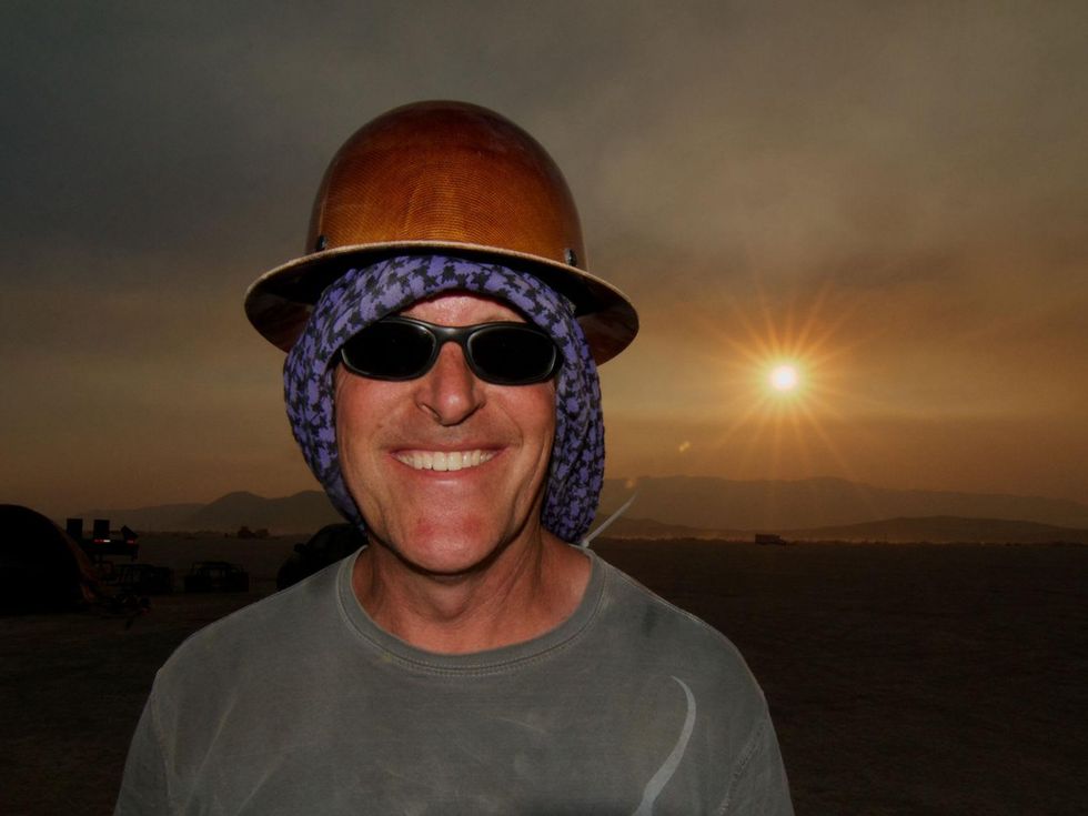 Robert Bob Bacon Primordial Fish head shot with sunrise