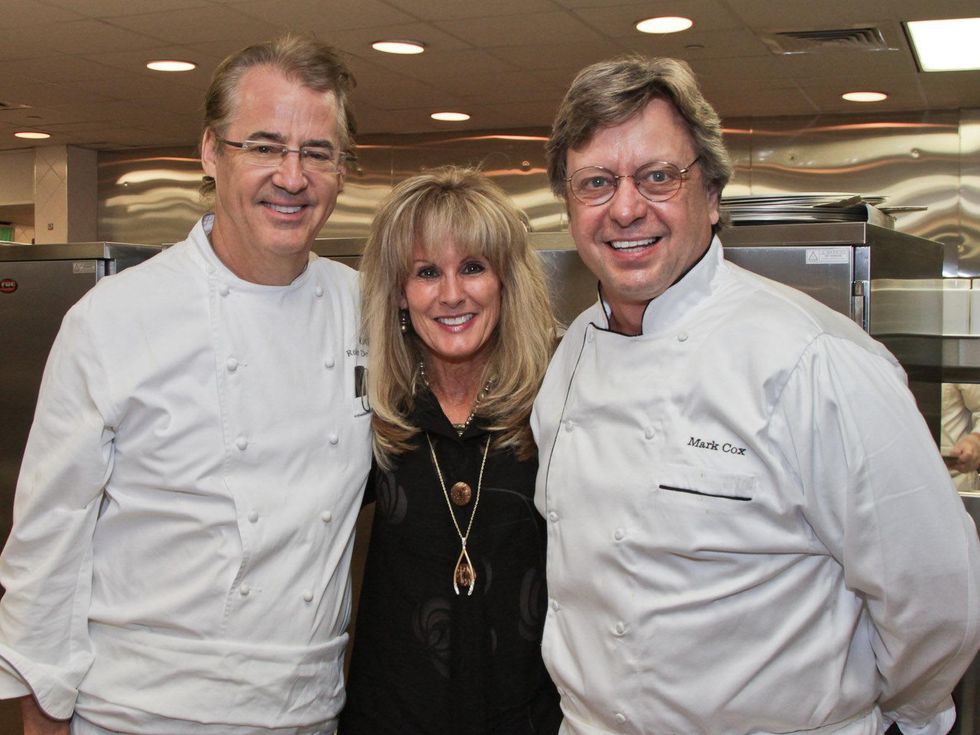 Robert Del Grande, from left, Laura Heatherly and Mark Cox at the Best Cellars dinner.