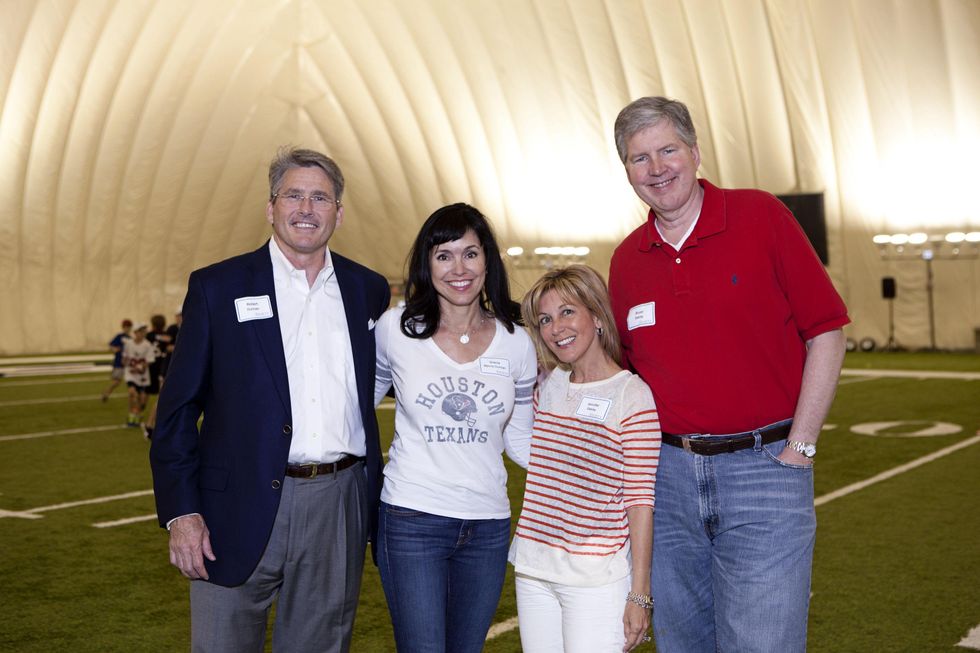 Robert Duncan and Gracia Wynne Duncan, from left, and Jennifer and Bruce Oakley at The Society for Leading Medicine Houston Texans Family Field Day May 2014
