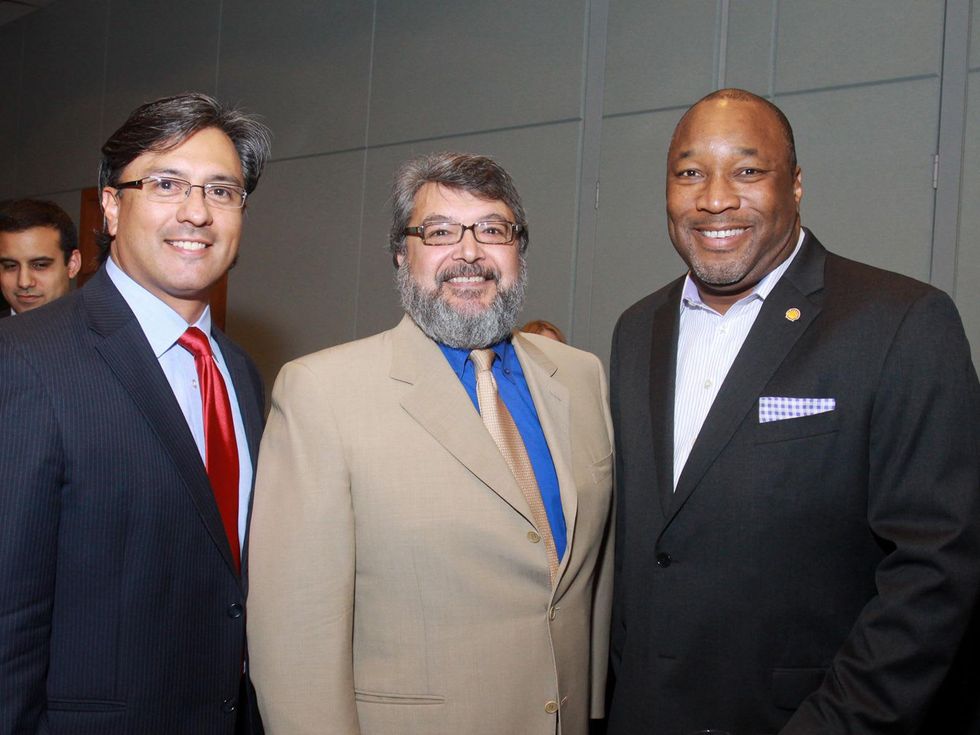 Robert Ledesma, from left, John Esquivel and Brian Hall at the Emerging Leaders Institute 2013 class graduation.