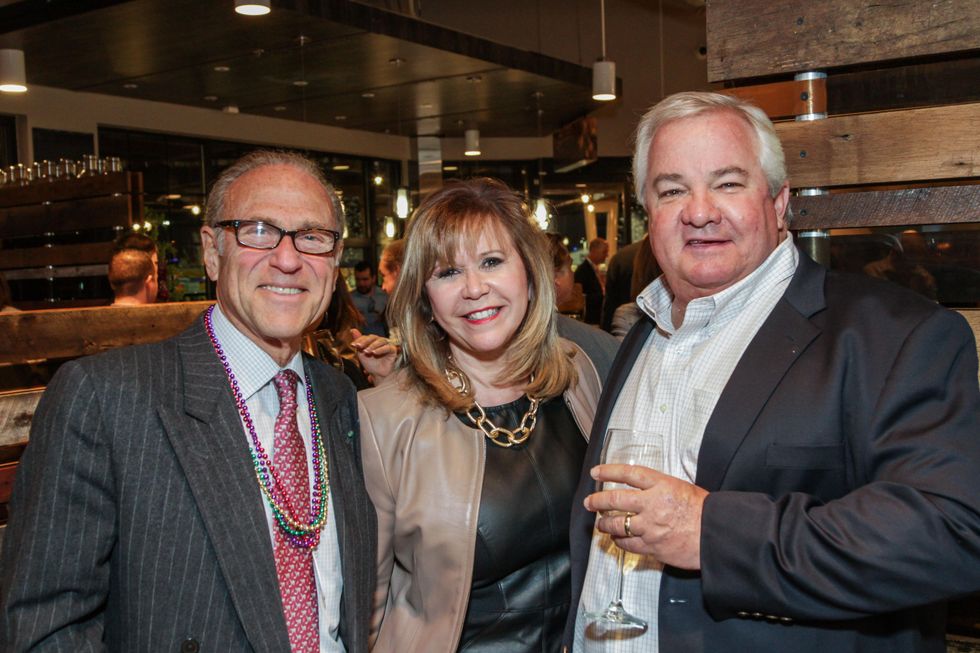 Robert Sakowitz, from left, Cyndy Garza-Roberts and Hank Wetzel at the H-E-B San Felipe and Table 57 Social February 2015