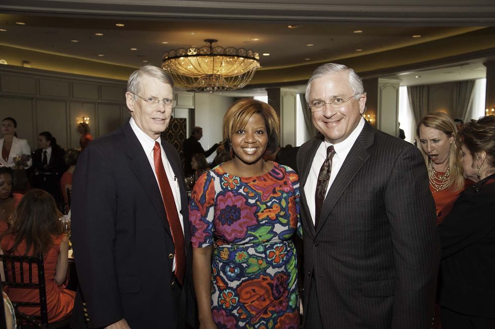 Robert Trainer Jr., from left, Myra Robinson and Randy Walker at the Go Red For Women luncheon May 2014
