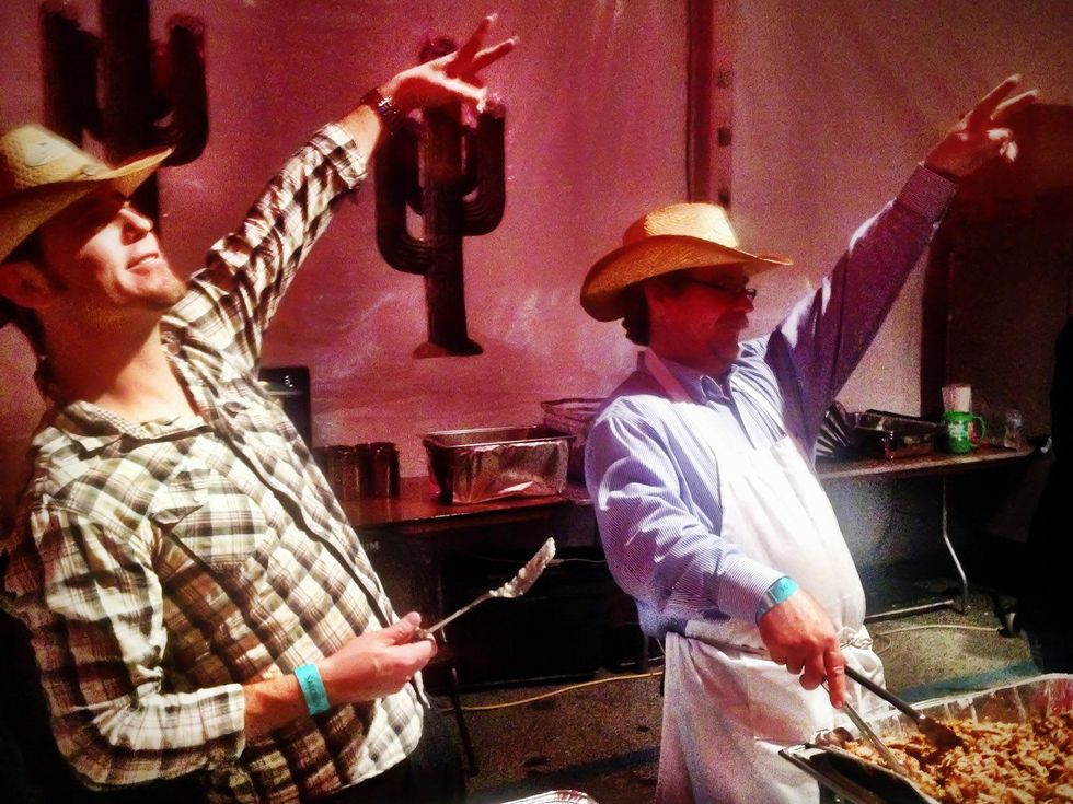 RodeoHouston, barbecue cook-off, February 2013, Servers at the Smokin' Amigos tent didn't let work stop them from having a good time