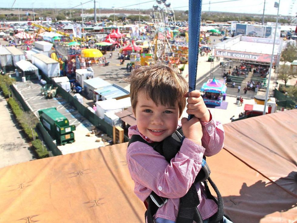 RodeoHouston, family friendly attractions, March 2013, Wyatt on the zip line