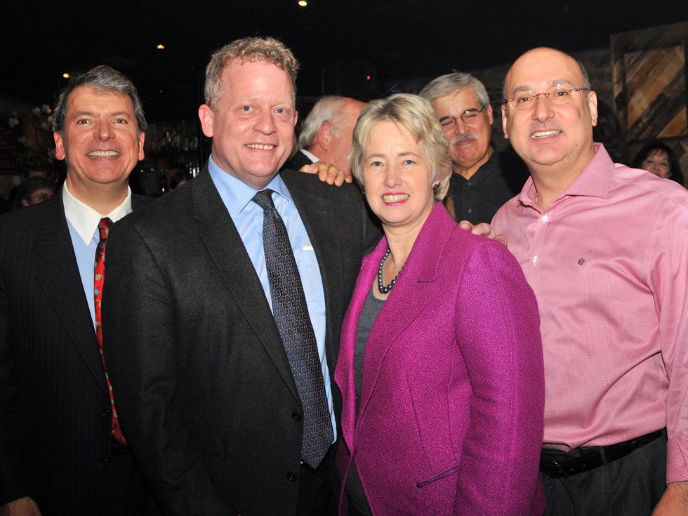 Roland Garcia, from left, David Robinson, Mayor Annise Parker and Gilbert Garcia at the Mayor's Hispanic Advisory Board Holiday Party December 2013
