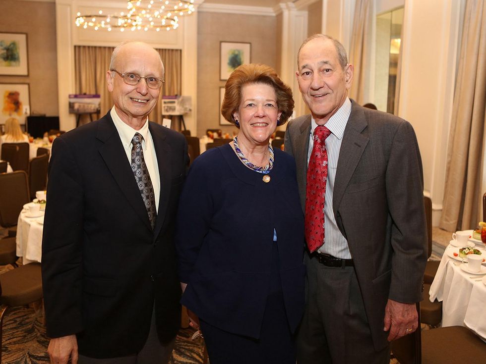 Rolland and Sherry St. Aubin, from left, with Ulyesse LeGrange at the LSU Foundation luncheon June 2014