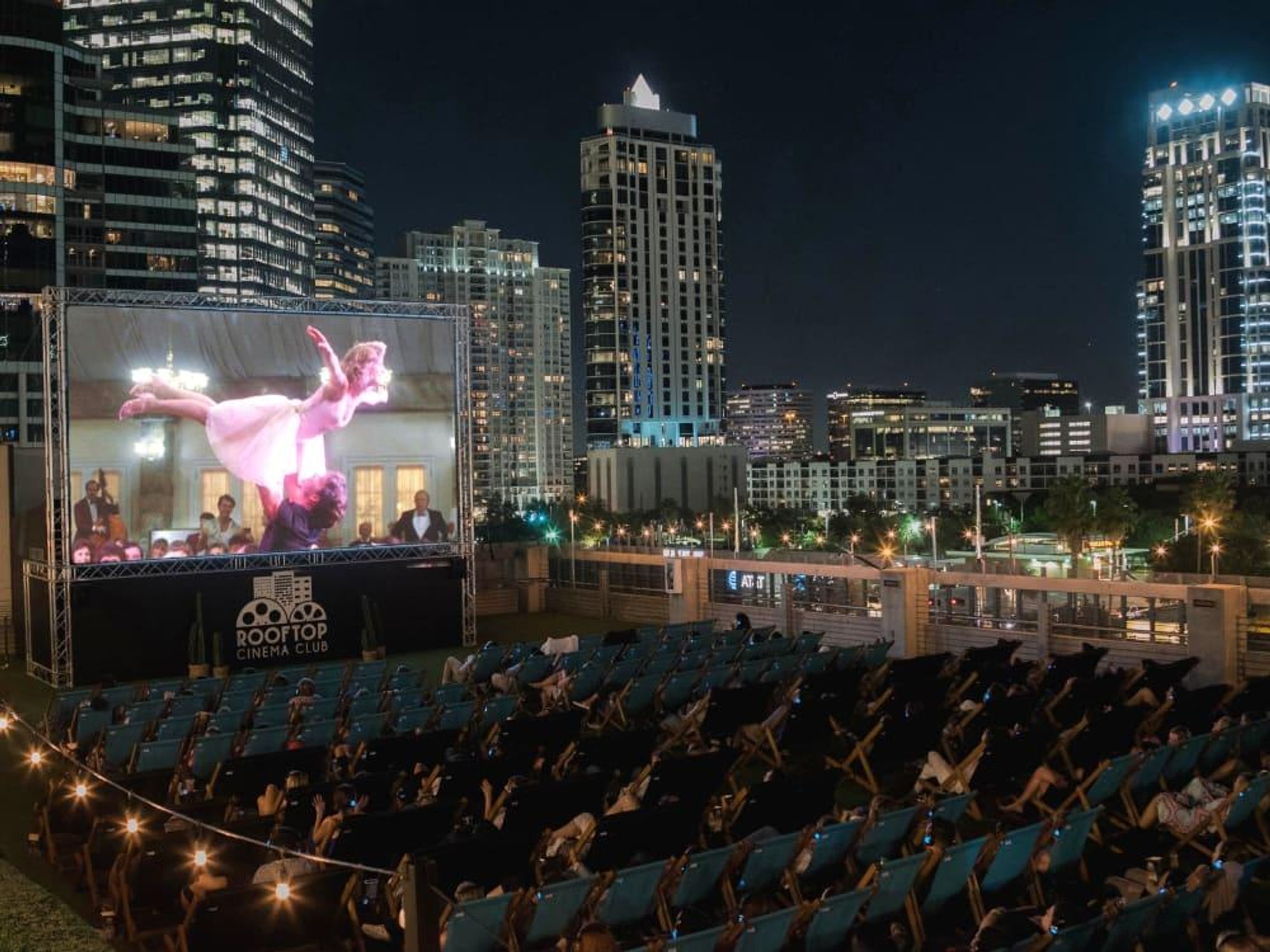 Rooftop Cinema Club Houston night skyline