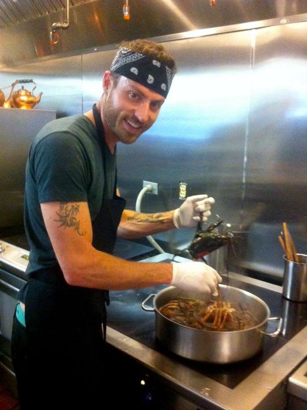 Roots Bistro Chandler Rothbard with lobster at pot on stove