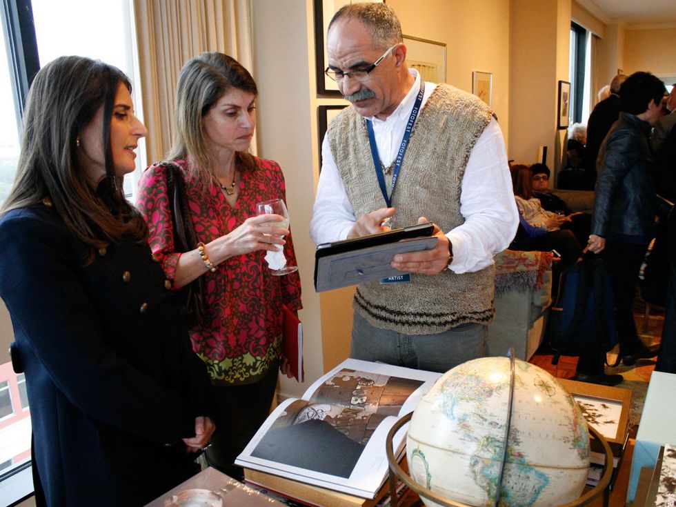 Rudeina Baasiri, from left, Hadia Mawlawi and Ayman ElSemary at Slavka Glaser's FotoFest reception March 2014