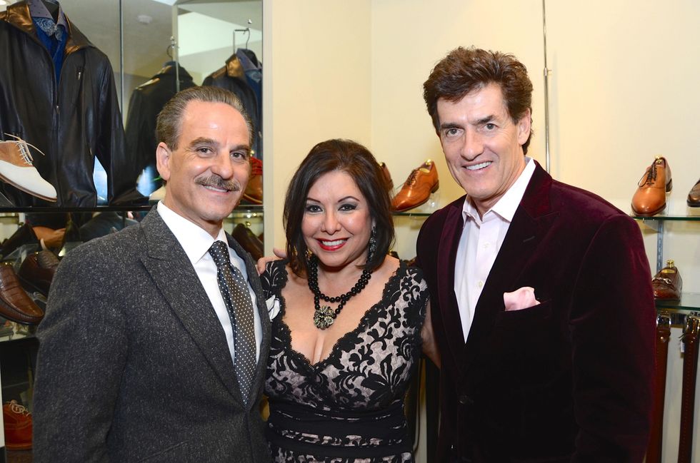 Rudy and Debbie Festari, left, with Nick Florescu at the Festari Holiday Party December 2014