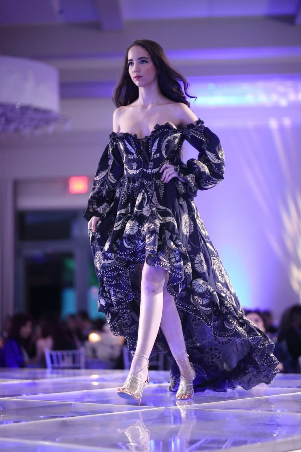 Runway model fashion show by The Webster