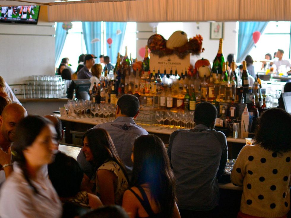 Saint Genevieve Houston people at bar