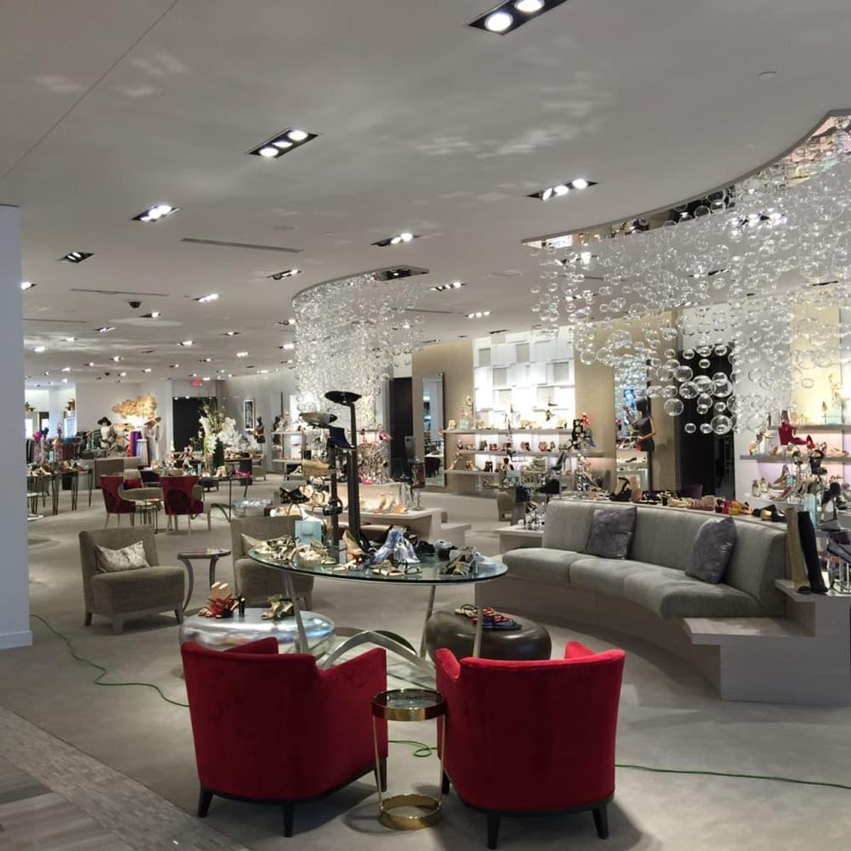 New Saks Fifth Avenue salon defined by whmisical glass spline