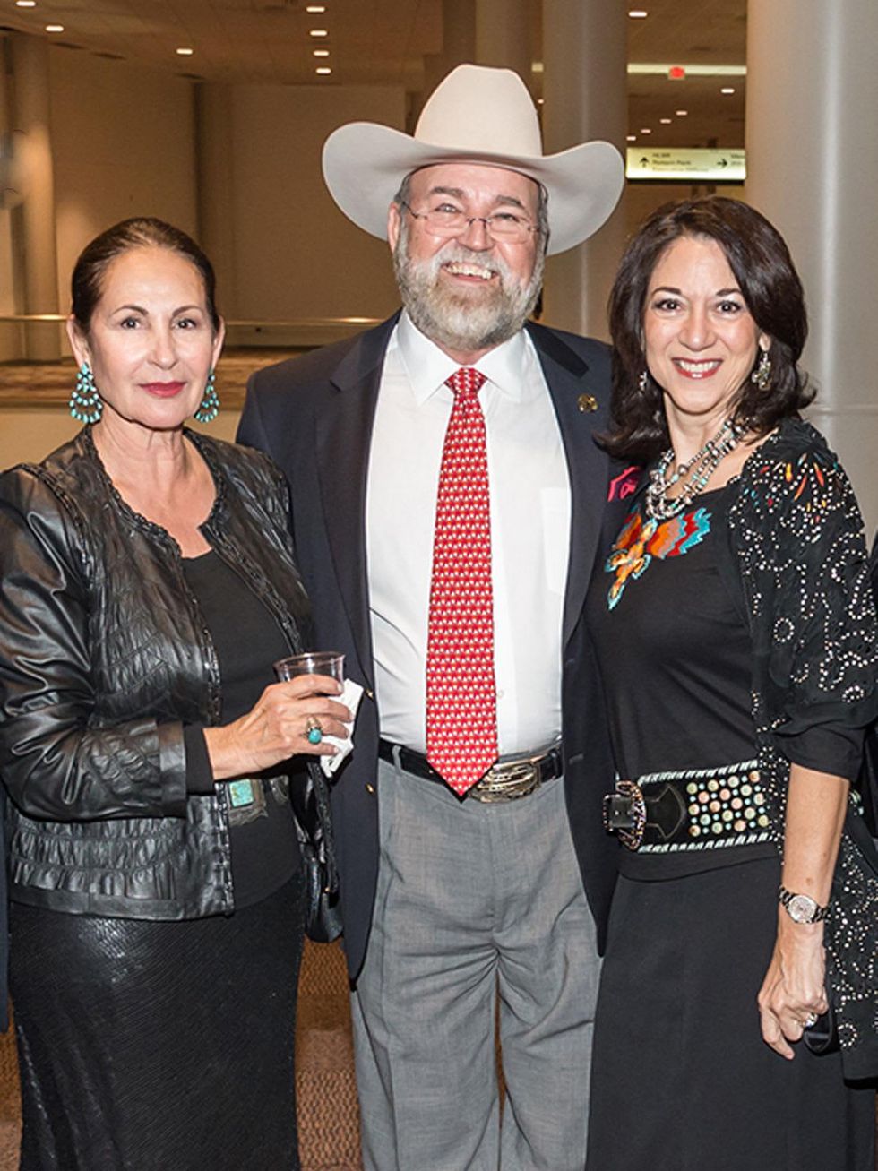 Sally Flores, from left, with Ed and Mary Alice Lester at the HLSR Hide Party January 2014