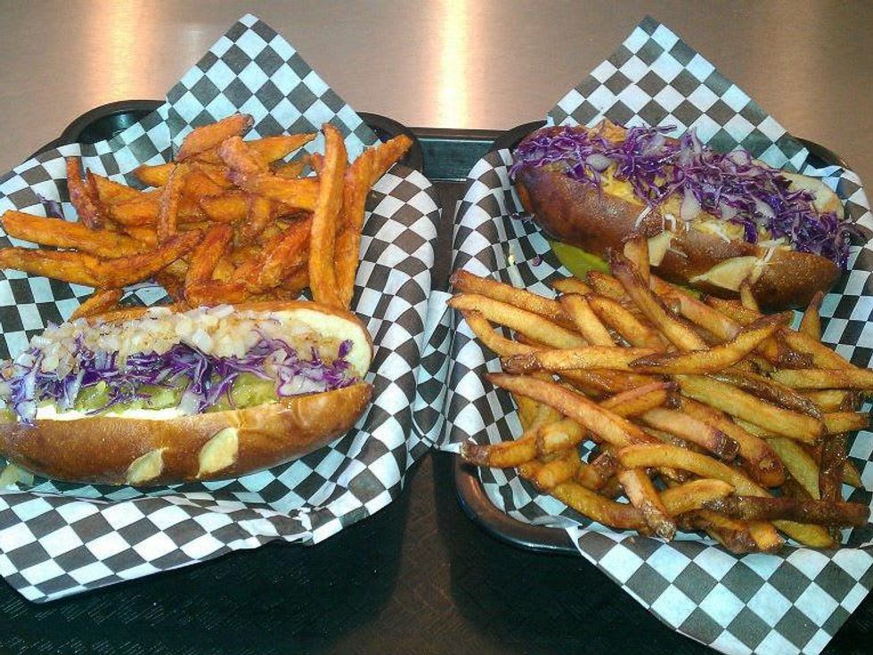 Sammy's Wild Game Grill buffalo sausage hot dogs with french fries and sweet potato fries