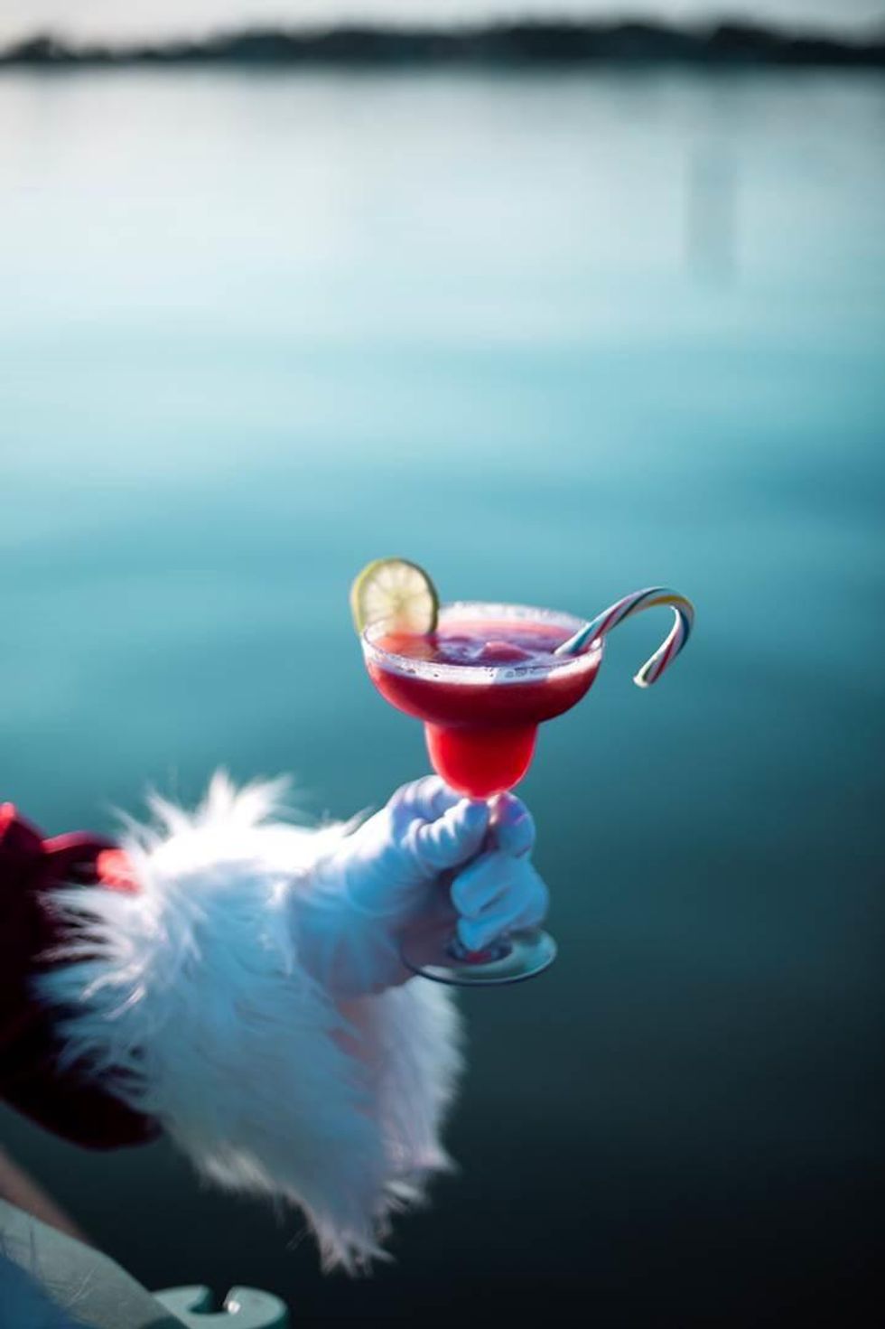 Santa holding a cocktail