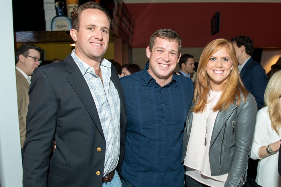 Scott Thelander, from left, Jon Weeks and Amber Hartland at the Friday Night Lights Depelchin benefit November 2014