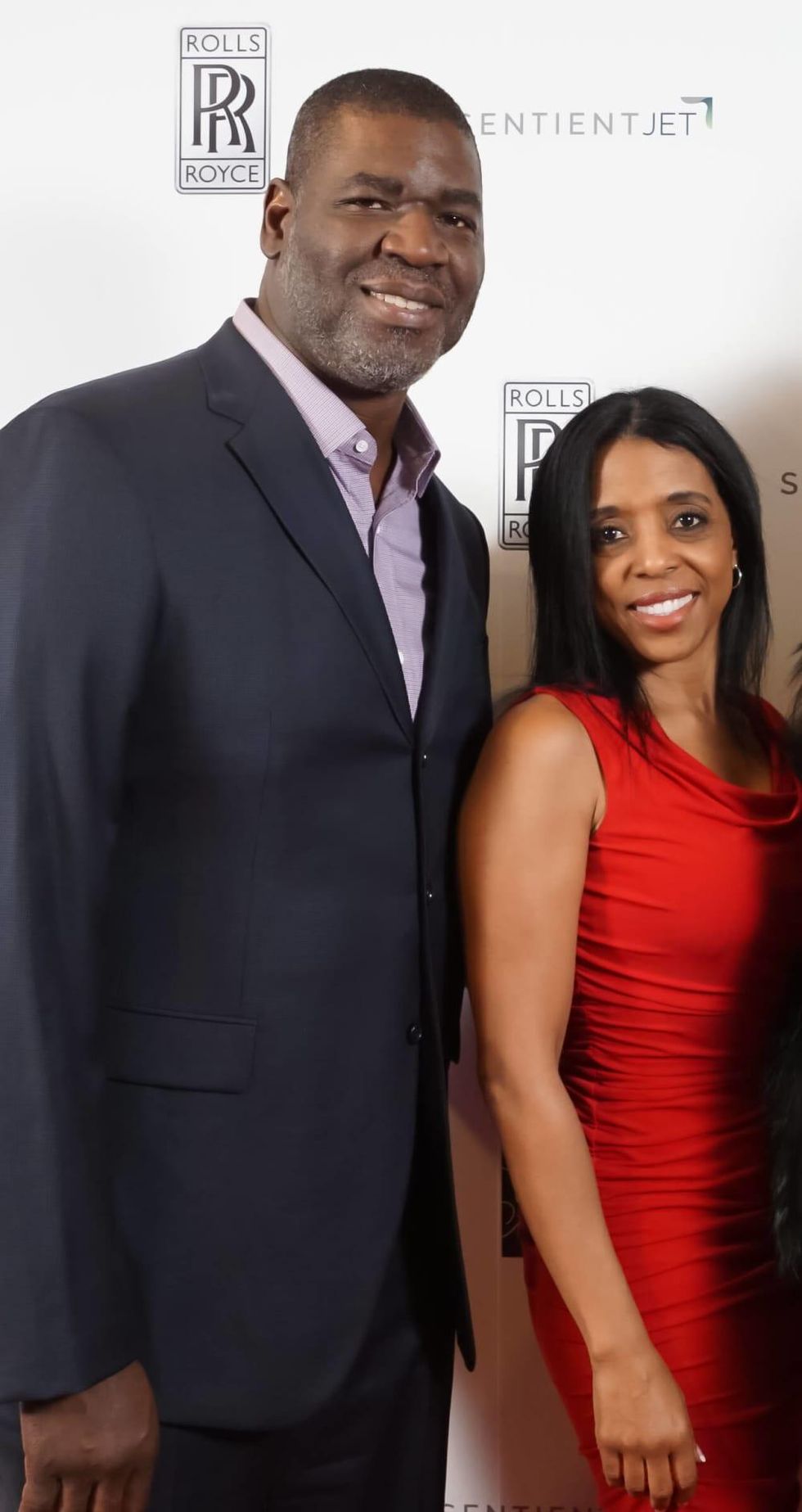 Sean Jones and wife at Saks Fifth Avenue Super Bowl party