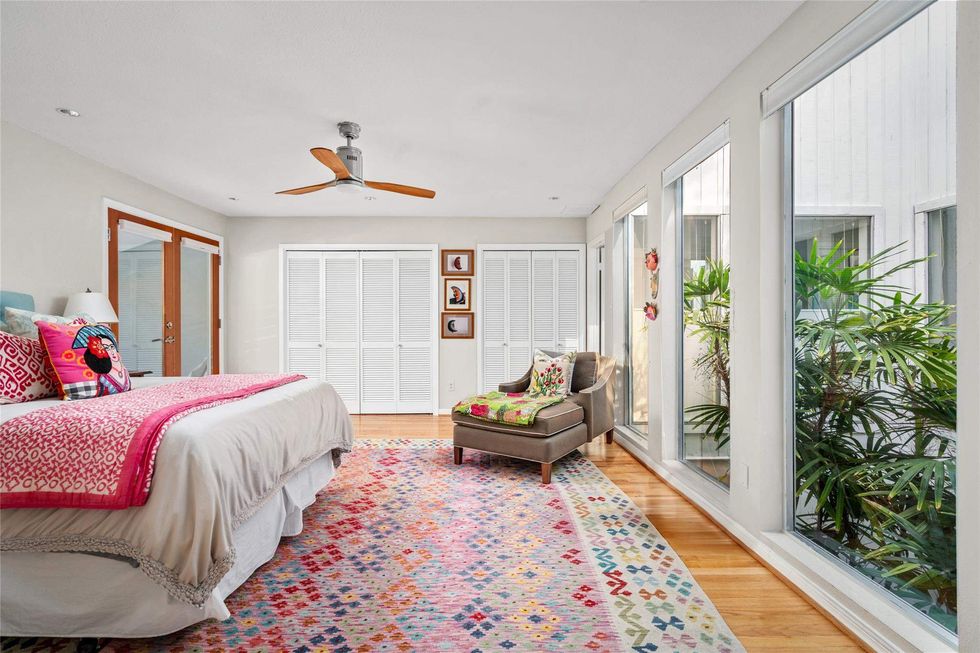 Second bedroom of 1507 Harold Street overlooks the home's atrium.