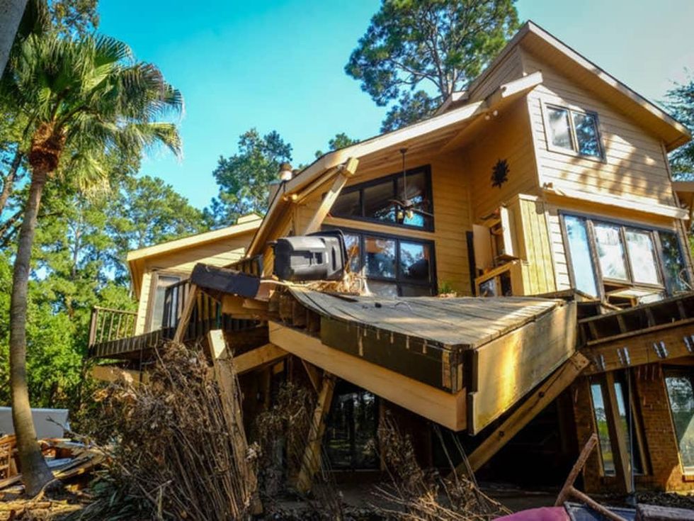 September 9, 2017. Humble, Texas. Floodwater from Hurricane Harvey rose over 12 feet and ripped off the deck in front of this home, Houzz