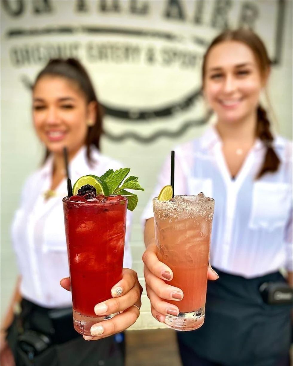 Servers with cocktails