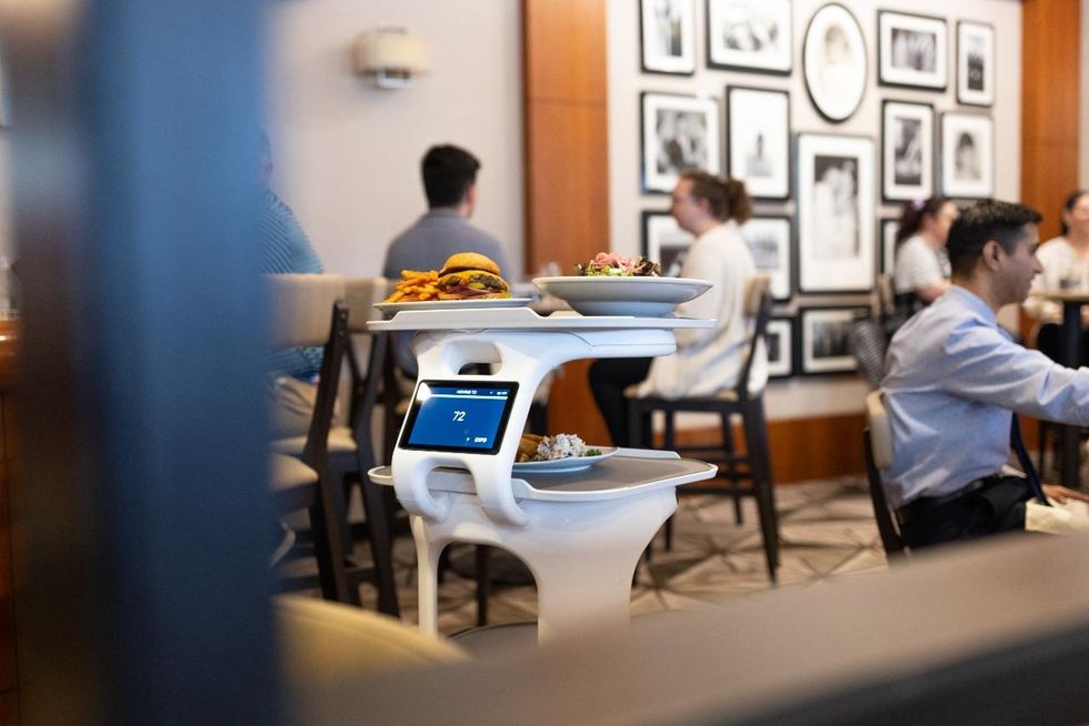 Servi robot University of Houston Eric's Restaurant Hilton College