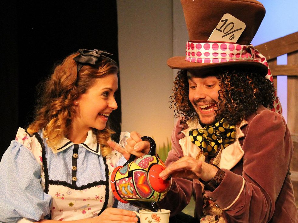 Shanae\u2019a Moore as Alice and Mark Ivy as the Mad Hatter Alice in Wonderland Main Street Theater