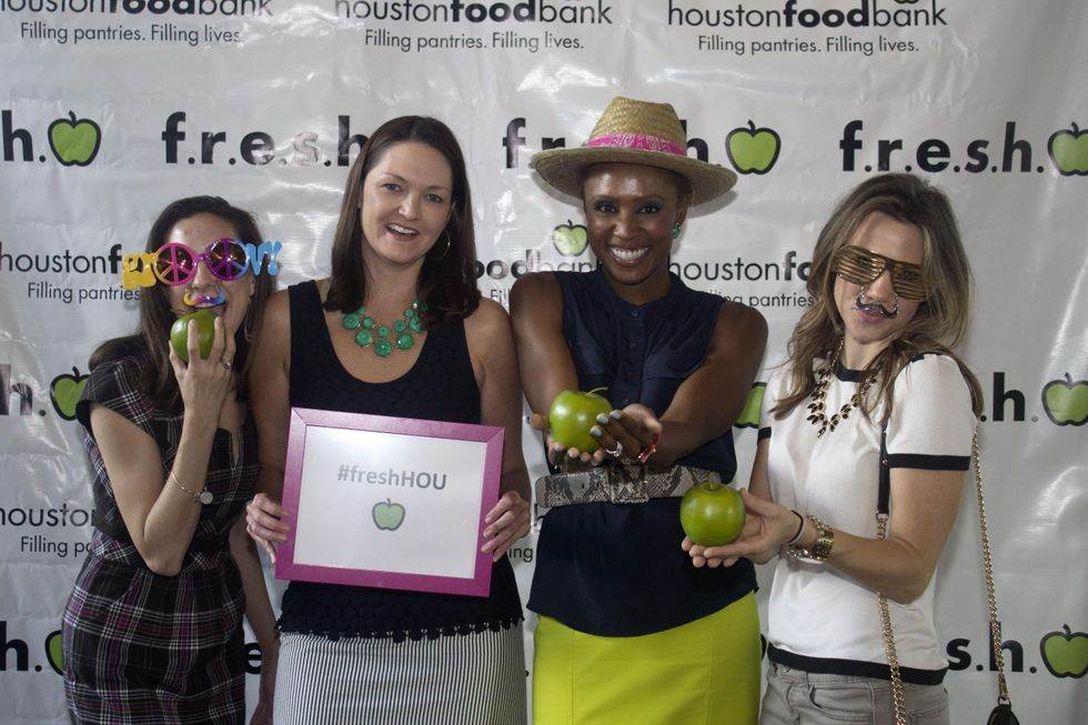 Shari Bingham from left, Lisa Pounds, Shavonnah Roberts Schreiber, and Lauren Yapundich at the f.r.e.s.h. new young professionals group party June 2014
