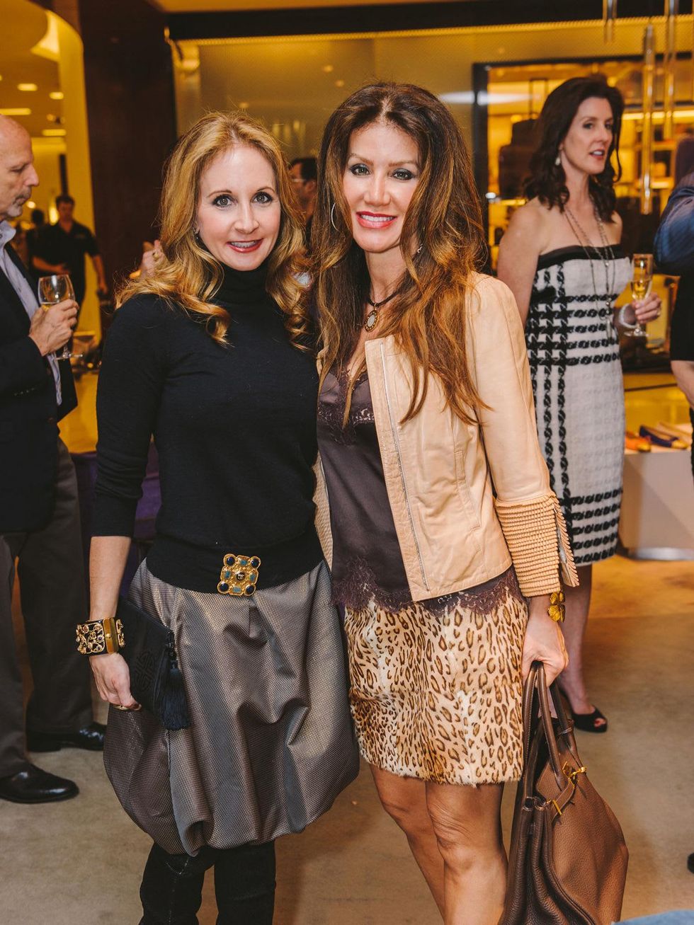 Sharin Norman, left, and Paula Fyhr at the Passion for Fashion kickoff December 2013