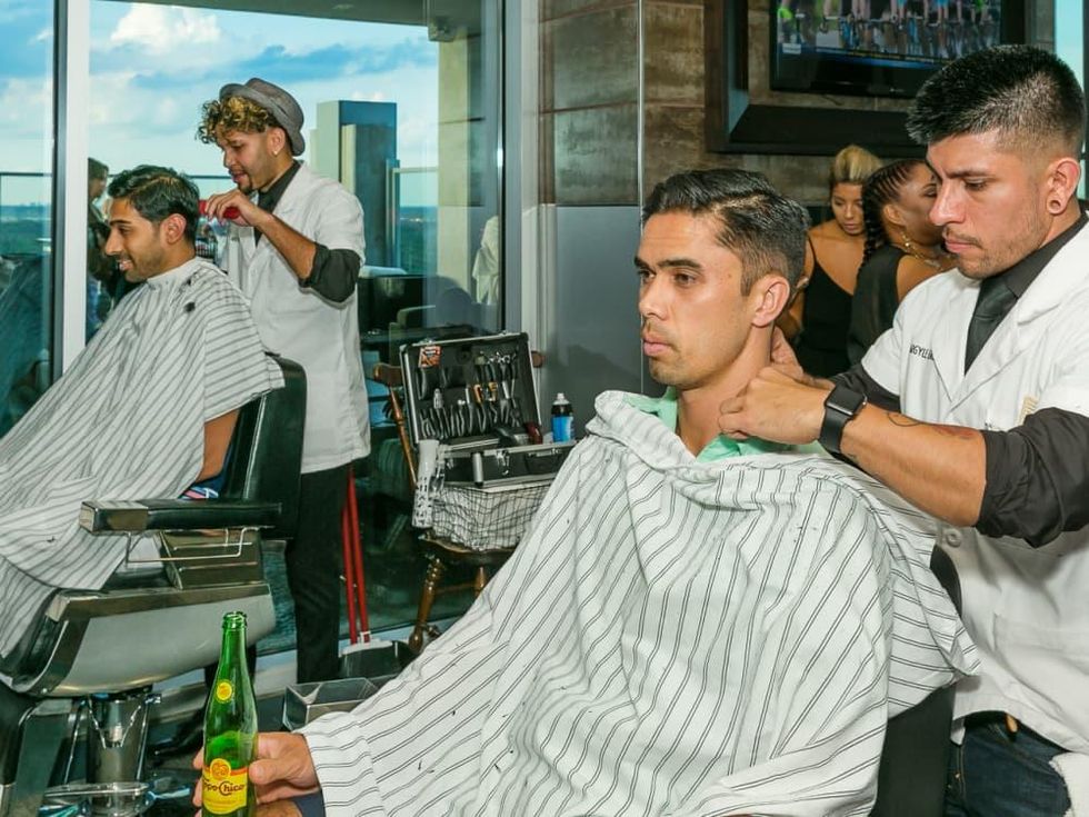 Shiraj Sen (Closest to the window), John Antonio (Green Shirt) haircuts by The Argyle League at CultureMap Social