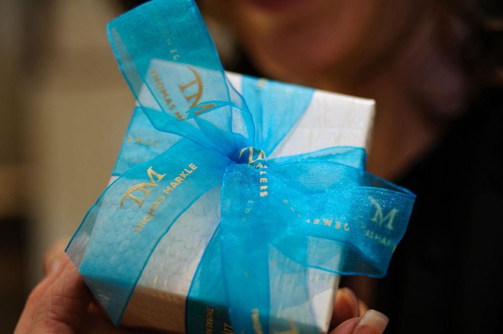 Signature gift wrapping at the Thomas Markle Jewelers grand opening at Gateway Memorial City December 2014